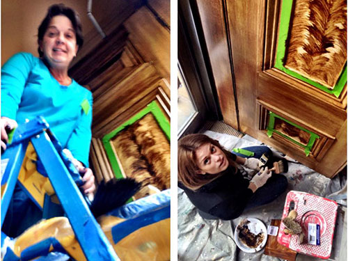 Emilie Stulb and Mary Demi applying a custom finish to the doors at The Athenaeum in Philadelphia