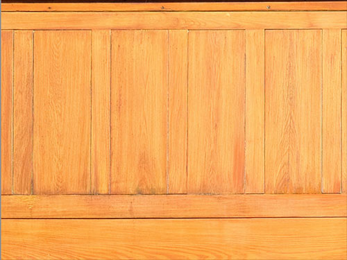 Detail of the cypress paneling on the Korman House after restoration by Old Village