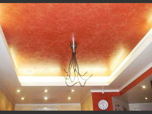 photo of terra cotta venetian plaster treatment on a recessed ceiling